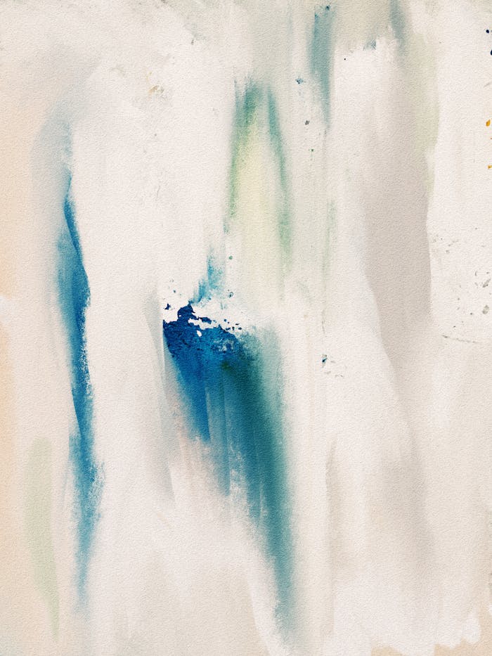 Soft abstract watercolor painting with flowing blue and white tones.